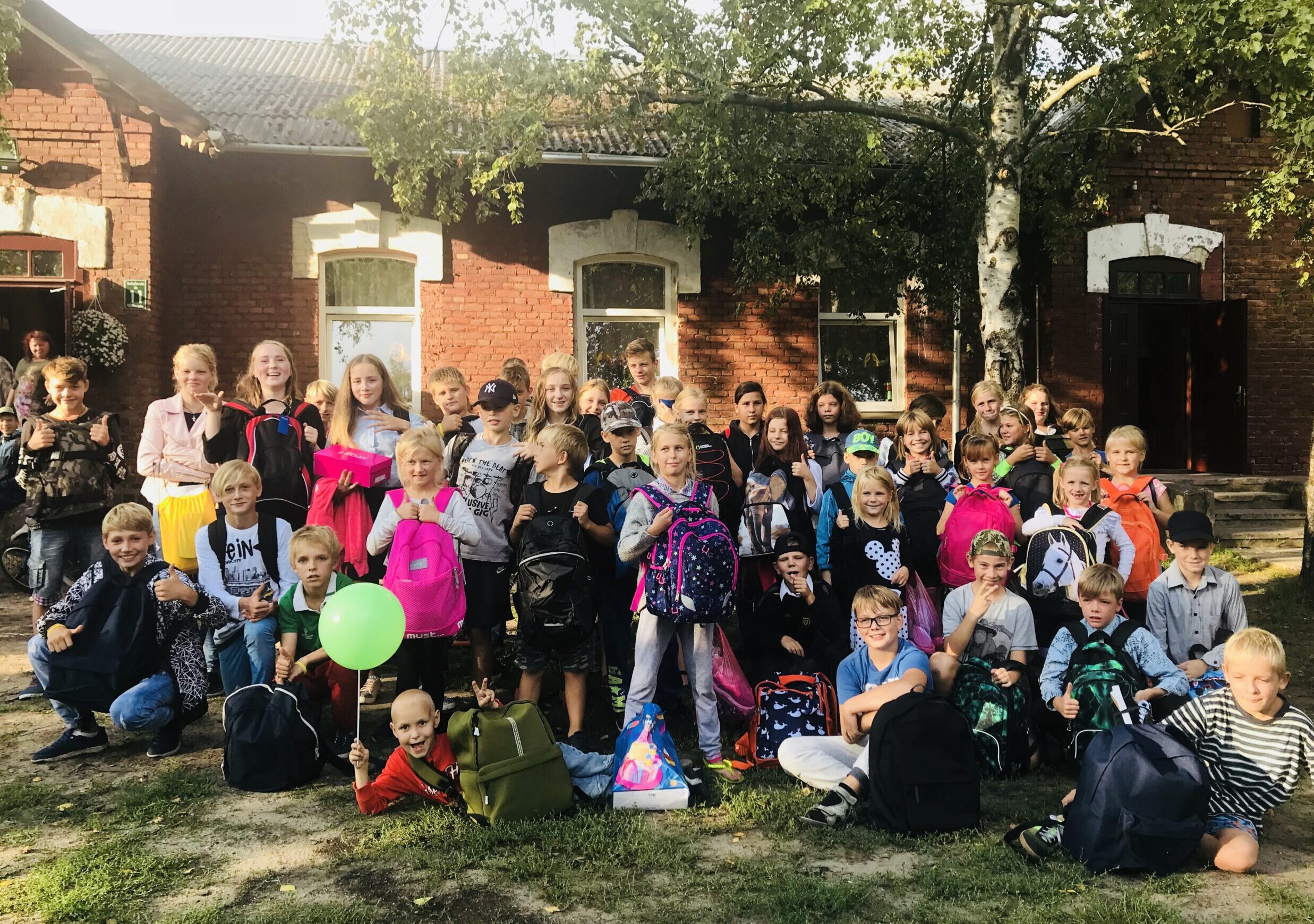 Kids with their new backpacks