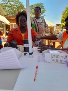 A client undergoes check-up at one of the health outreaches