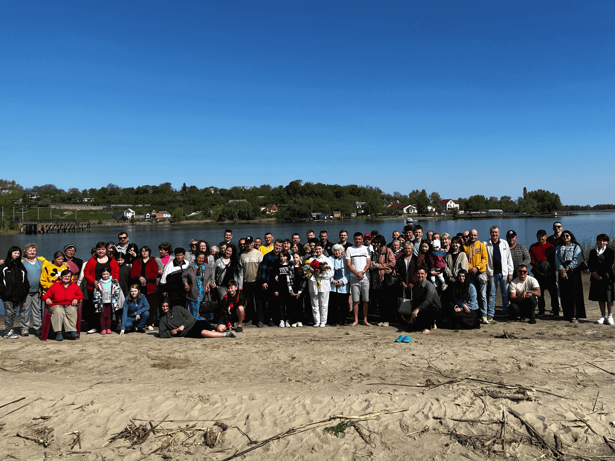 Some of the Rzhyshchiv Evangelical Church gathering after beach baptisms