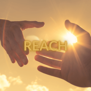 Reach - hands coming together in the sunlight with the word Reach in the front